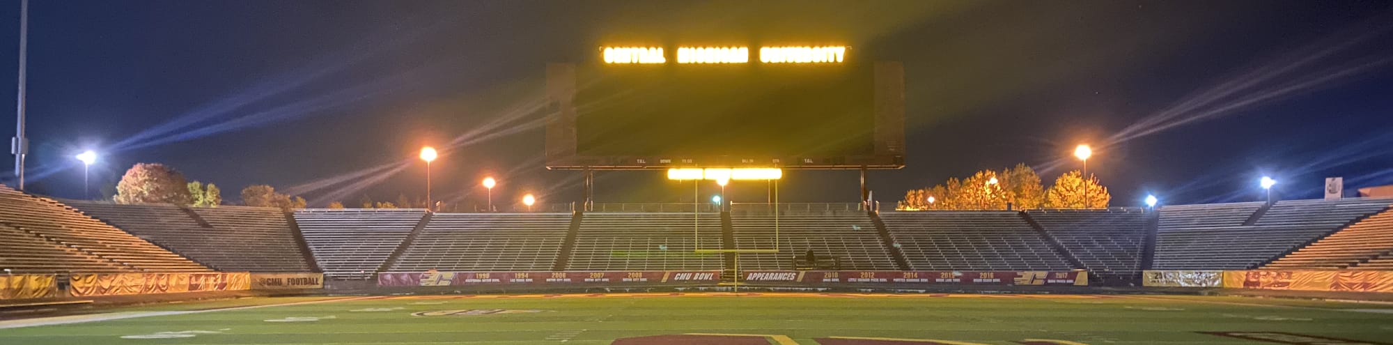 empty football stadium at night under the lights Boston